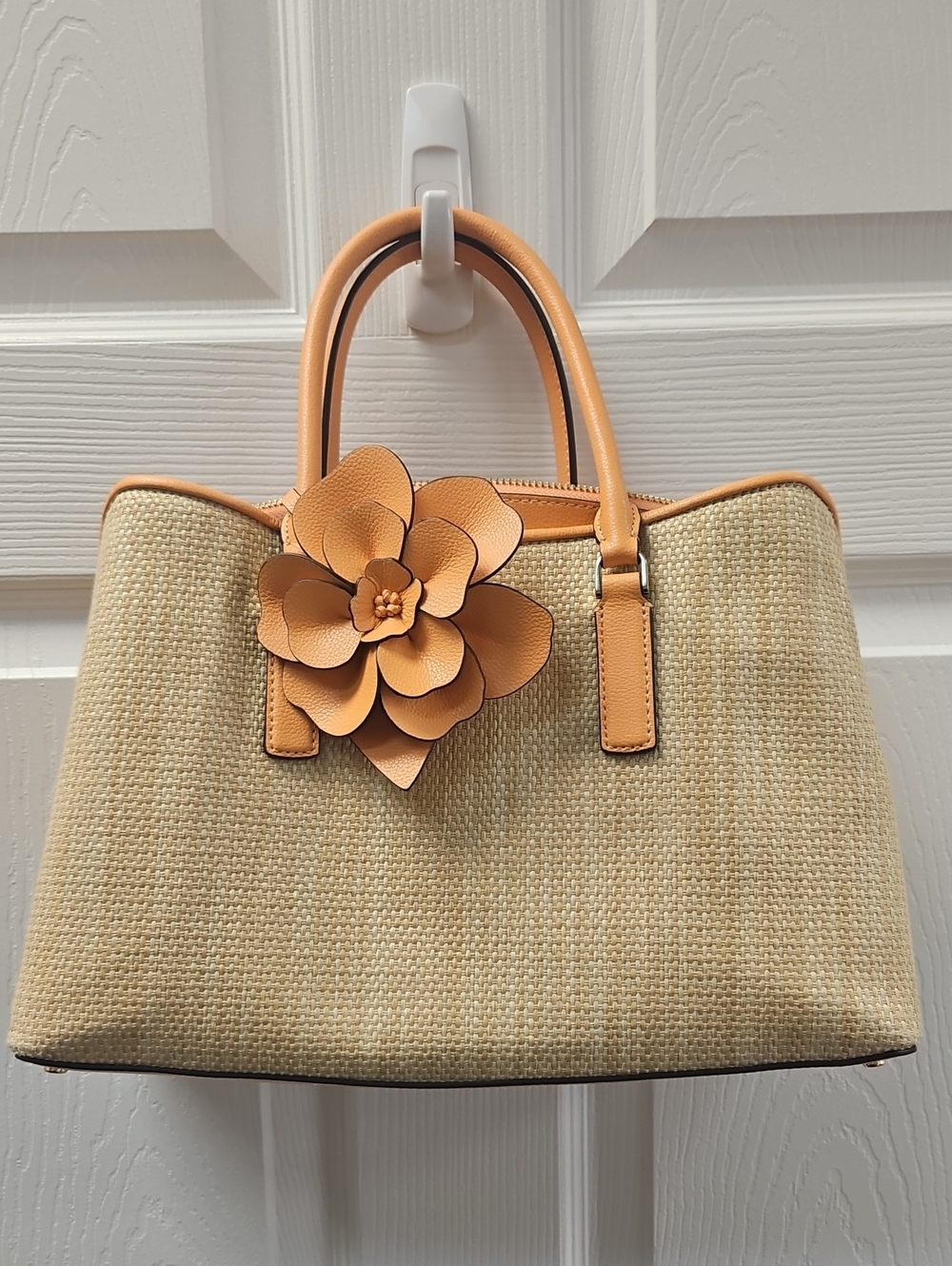 Kate Spade. Straw Tote Handbag with Orange Trim and Floral Accent.